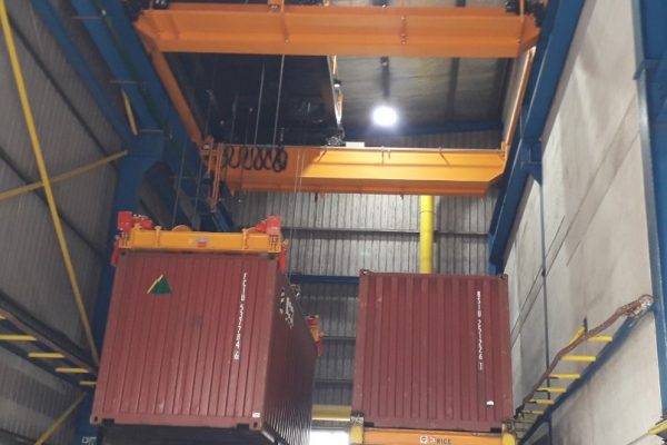 Container Spreader in a Warehouse